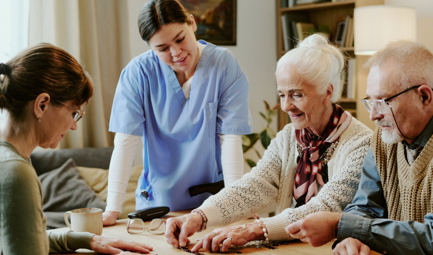 woman and senior assembling puzzle pieces